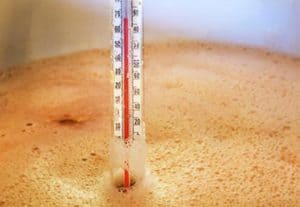 Thermometer on boiling beer